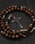 Handcrafted wooden rosary with desert tan paracord and copper St. Benedict crucifix