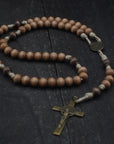 Bronze St. Benedict crucifix and medal centerpiece on durable tan paracord rosary built for daily prayer