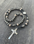 Handcrafted rosary for the Holy Souls featuring silver crucifix and gray charcoal wood beads