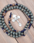 Silver crucifix detail symbolizing strength and devotion on handmade King of Glory rosary