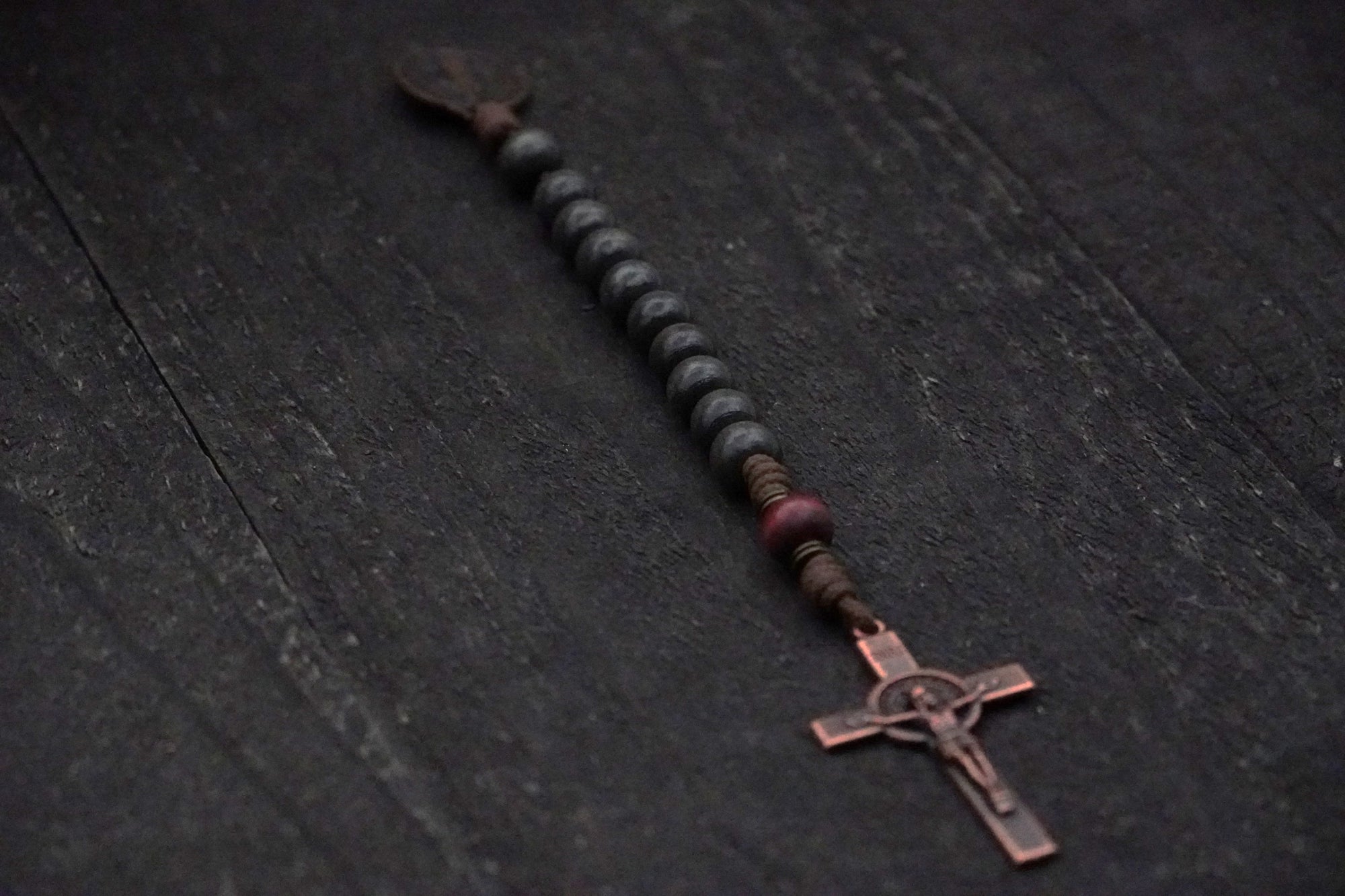 Rugged pocket rosary for daily prayer with bronze Pardon Crucifix and hand-stained wood beads”