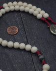 Rugged handmade Pope Leo XIV rosary crafted in Fargo ND with bronze crucifix and charcoal wood beads