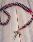 Roma Victor rosary with purple wooden beads, bronze St. Benedict crucifix, and durable paracord