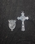 Silver crucifix detail symbolizing purity and faith on handmade St. Maria Goretti rosary