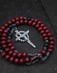 Rugged handmade St. Michael rosary crafted in Fargo ND with silver crucifix and red wooden beads