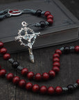St. Michael rosary with red and black wooden beads, silver Crown of Thorns crucifix, and durable paracord