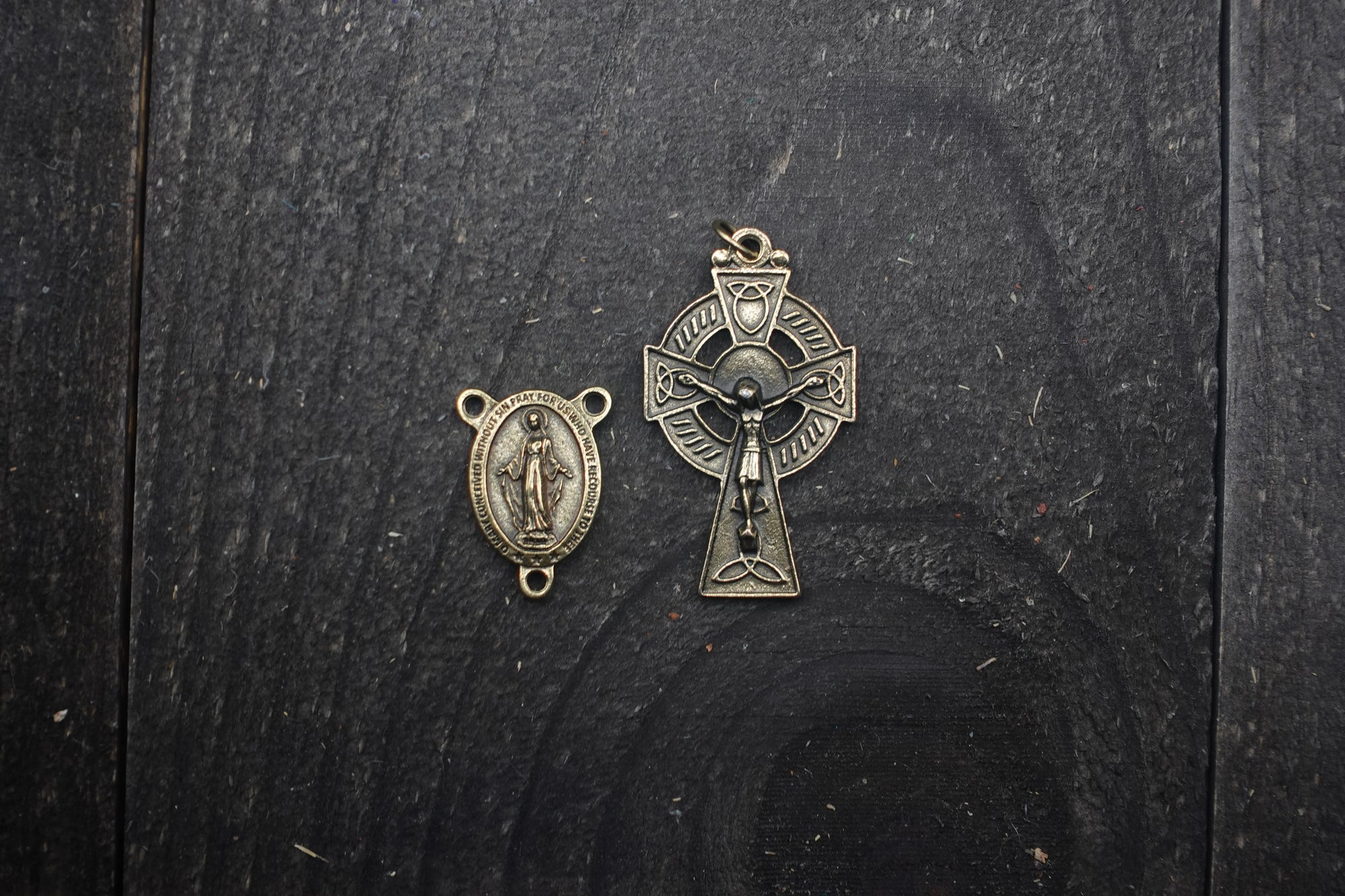 striking bronze Celtic crucifix and black paracord detail on St. Patrick rosary crafted in Fargo ND