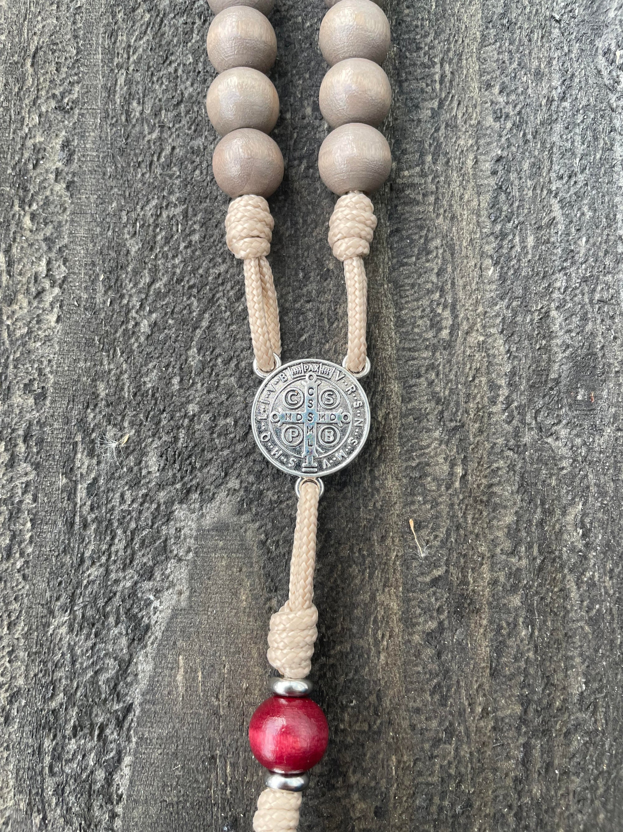 Oxidized silver St. Benedict crucifix detail on Bethlehem Christmas rosary with wooden beads