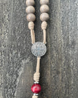 Oxidized silver St. Benedict crucifix detail on Bethlehem Christmas rosary with wooden beads