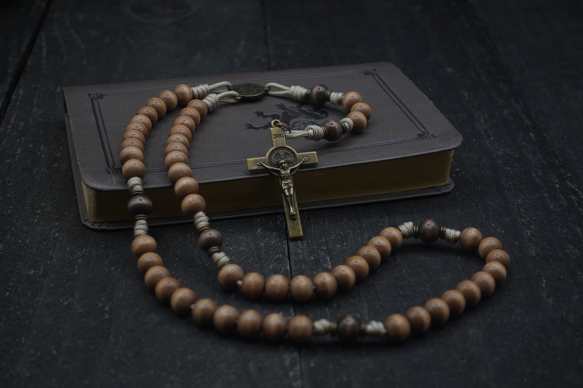 Handcrafted wooden beads in tan and gray-brown on strong paracord rosary inspired by Saul’s encounter with Jesus