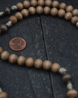 Road to Damascus paracord rosary with tan and gray-brown wooden beads and bronze St. Benedict crucifix, handcrafted in Fargo ND