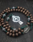Handcrafted Celtic Catholic rosary for daily prayer featuring silver crucifix and wooden beads