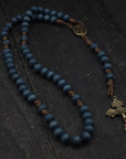 Handcrafted Lepanto Catholic rosary for daily prayer featuring bronze crucifix and blue wooden beads