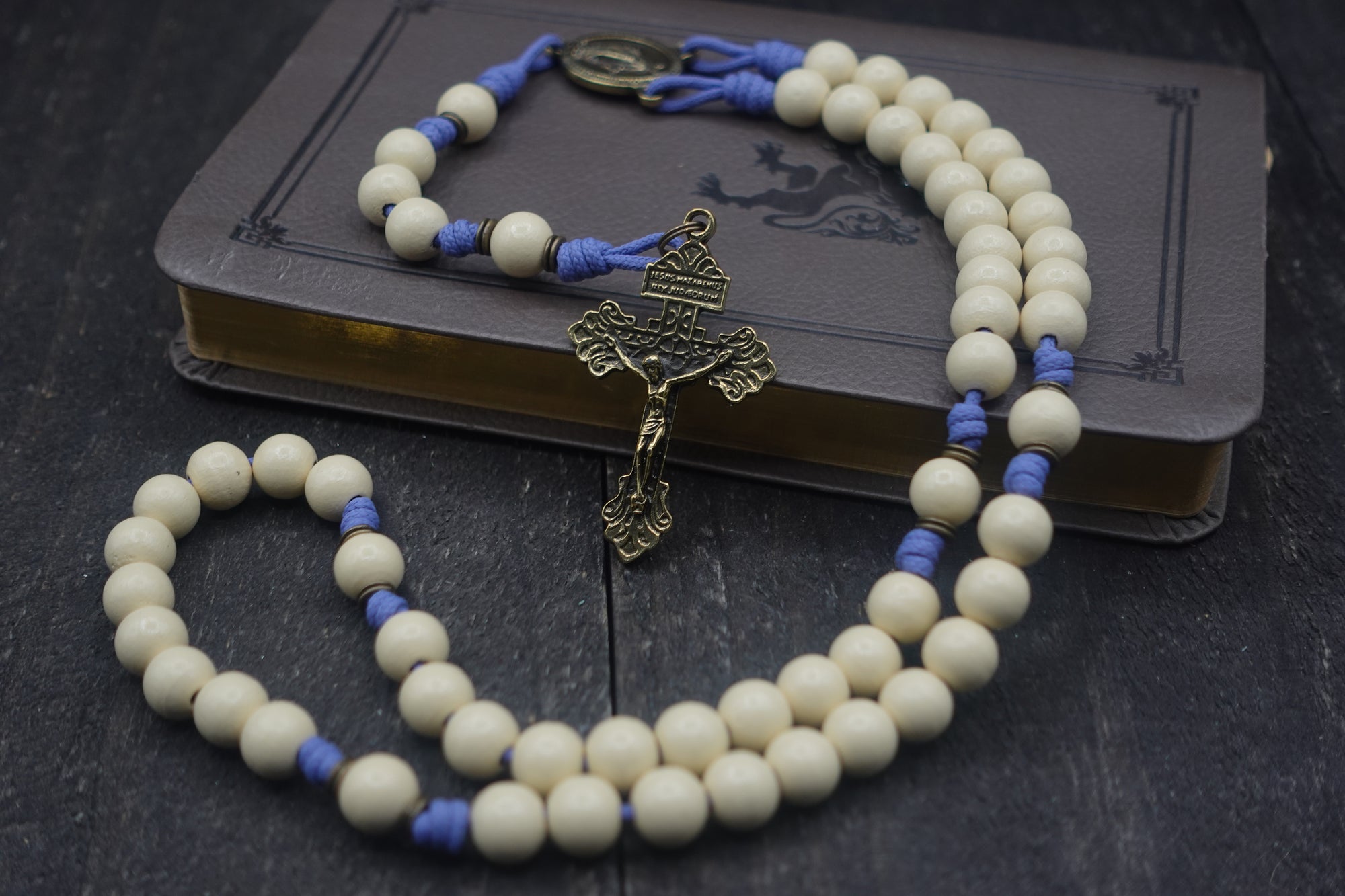 Marian Devotion womens rosary with vintage white wooden beads, bronze Pardon crucifix, and lavender paracord