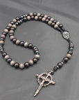 Rugged handmade Memento Mori rosary crafted in Fargo ND with silver crucifix and charcoal wood beads