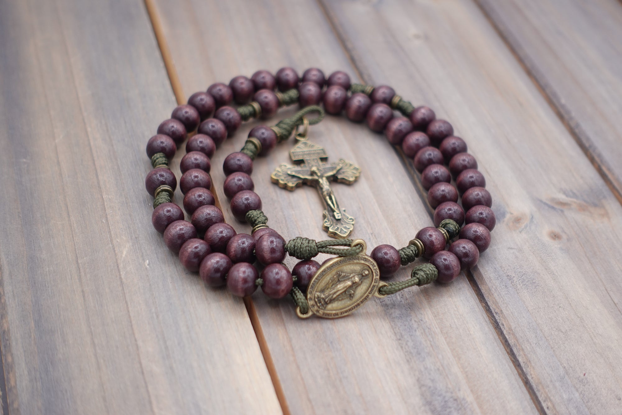 Rugged handmade Mount of Olives rosary crafted in Fargo ND with bronze crucifix and dark burgundy beads