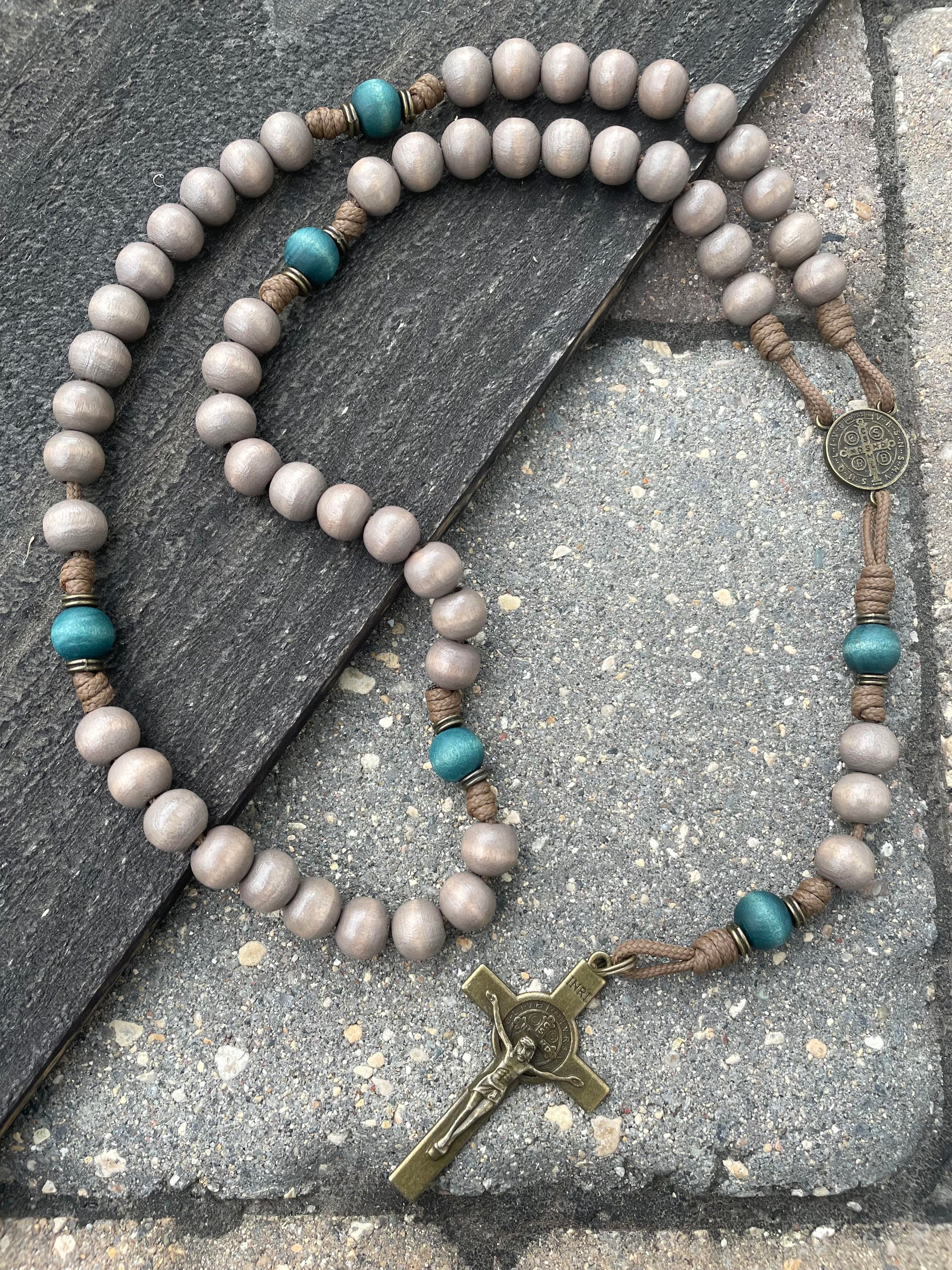 Rugged handmade Noel christmas rosary built for daily prayer with bronze crucifix and teal wood beads
