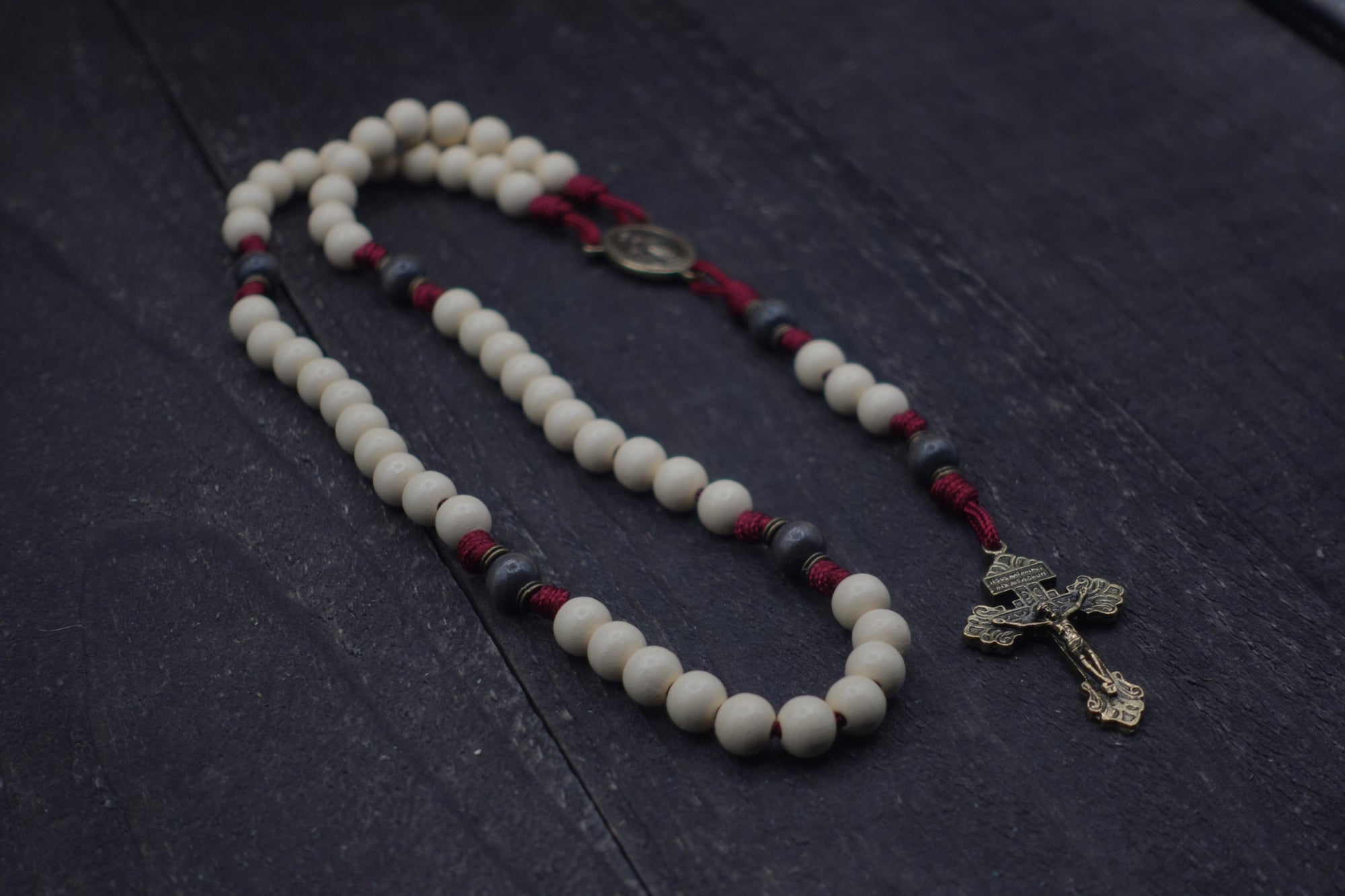 Handcrafted Pope Leo XIV rosary for daily prayer featuring bronze crucifix and vintage white wood beads