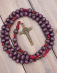 Rugged handmade Roma Victor rosary crafted in Fargo ND with bronze crucifix and purple wood beads