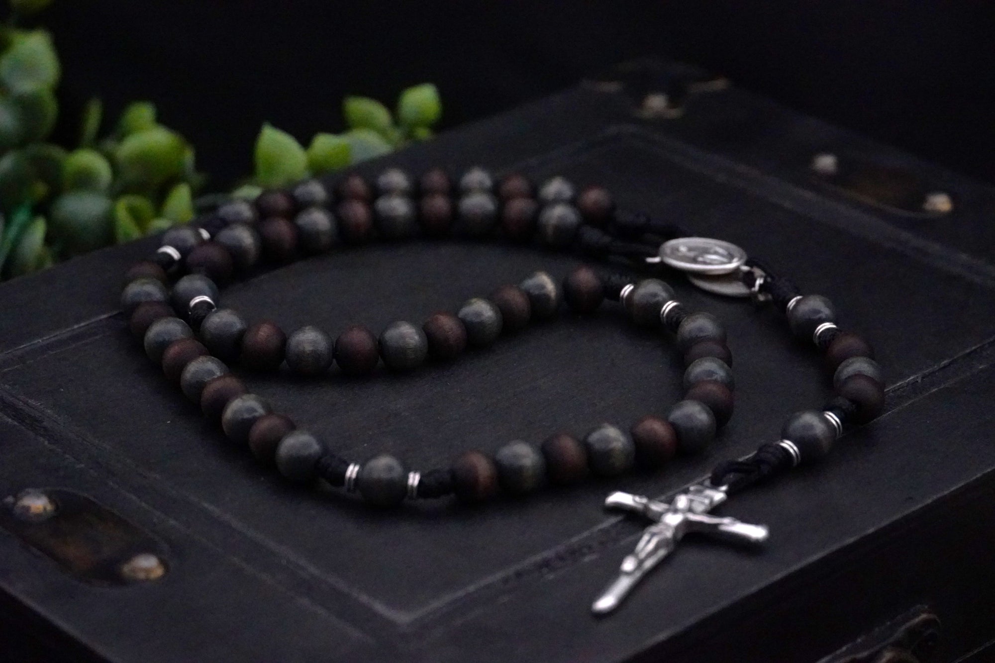 Handcrafted St. Ignatius rosary for Catholic men featuring silver crucifix and walnut wood beads