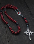 St. Michael rosary by Runewood Rosary combining red and black wood beads with silver crucifix for spiritual strength