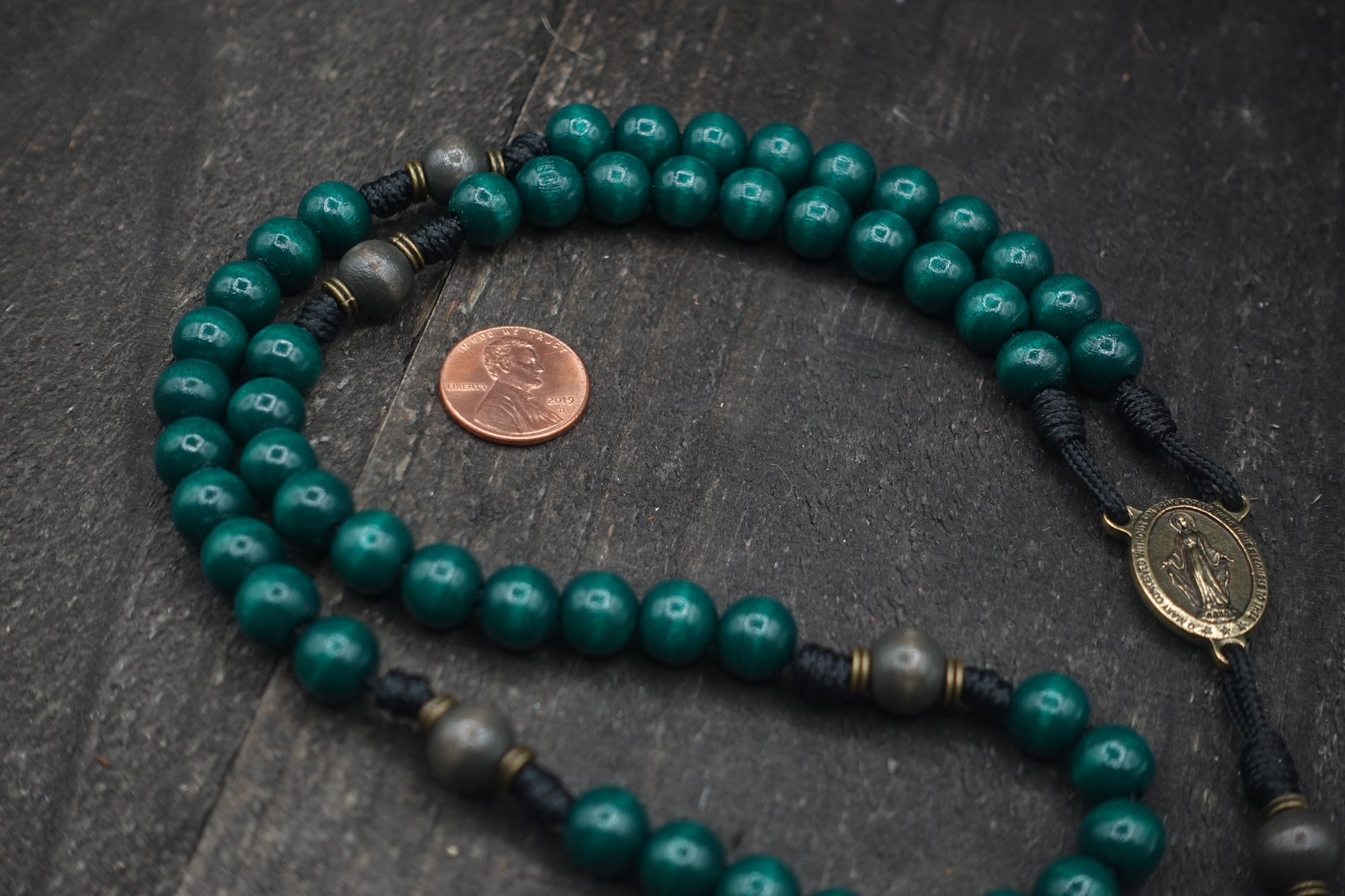 Bronze Celtic crucifix detail symbolizing faith and heritage on handmade St. Patrick rosary