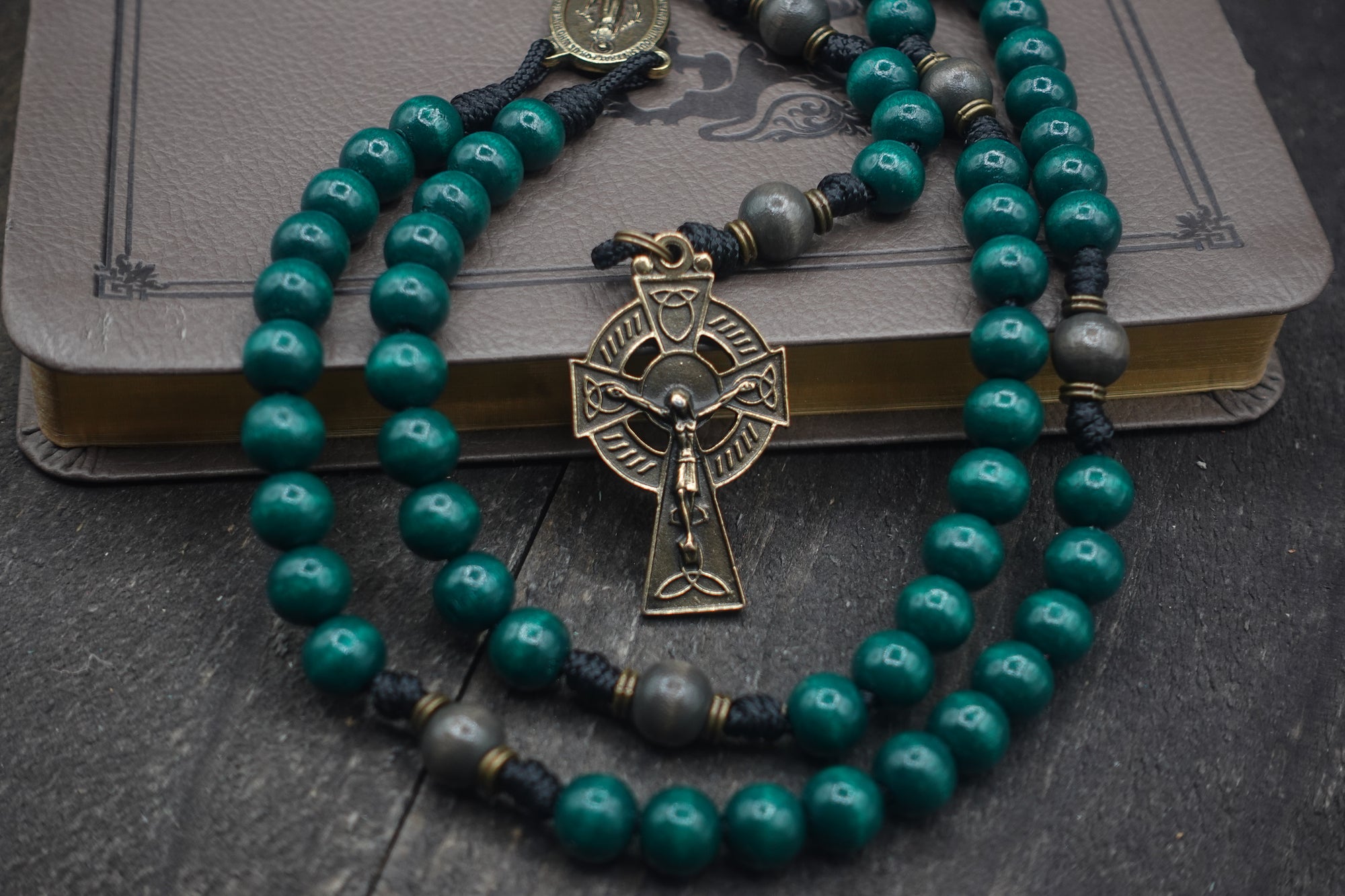 Wood bead detail showing natural variations on St. Patrick rosary handcrafted for daily prayer