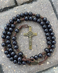 Handcrafted Black Benedictine rosary for daily prayer featuring bronze crucifix and black wooden beads