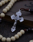 St. Teresa of Ávila rosary with vintage white and black wooden beads, silver Pardon crucifix, and walnut paracord